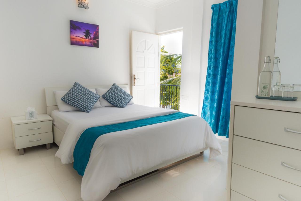 Palm Gate Hotel Thulusdhoo Bagian luar foto